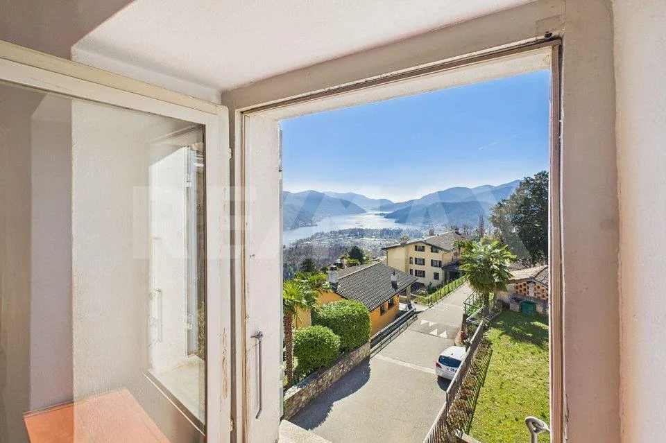 Casa bifamiliare con vista lago eleganza comfort e relax – Foto 6 von 13
