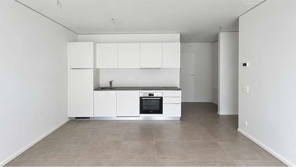 Moderno appartamento 2.5 locali con terrazza nella Residenza Due Laghi – Foto 6 von 13