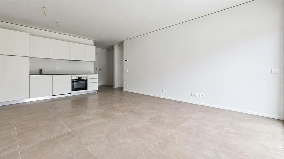 Moderno appartamento 2.5 locali con terrazza nella Residenza Due Laghi – Foto 5 von 13
