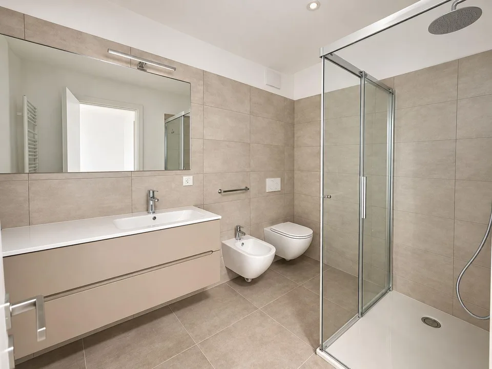 MENDRISIO - Geräumige 4.5-Zimmer-Wohnung mit Studio, privater Waschküche, Terrasse und Garten – Foto 9 von 14