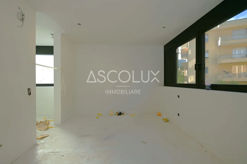 Appartamento 3,5 locali con grande terrazza coperta e 2 posti auto inclusi – foto 11 di 28