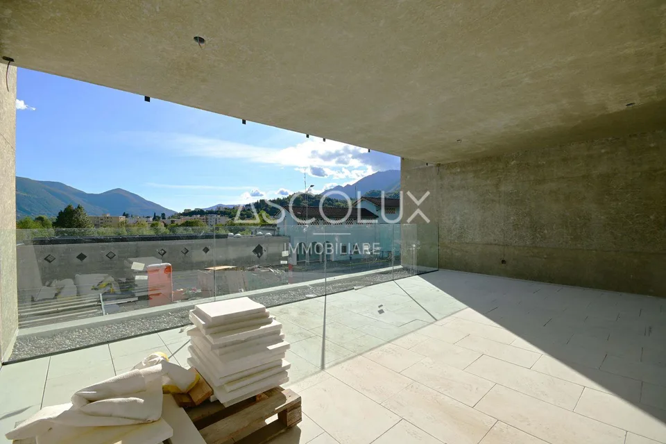 Appartamento 3,5 locali con grande terrazza coperta e 2 posti auto inclusi – foto 3 di 28