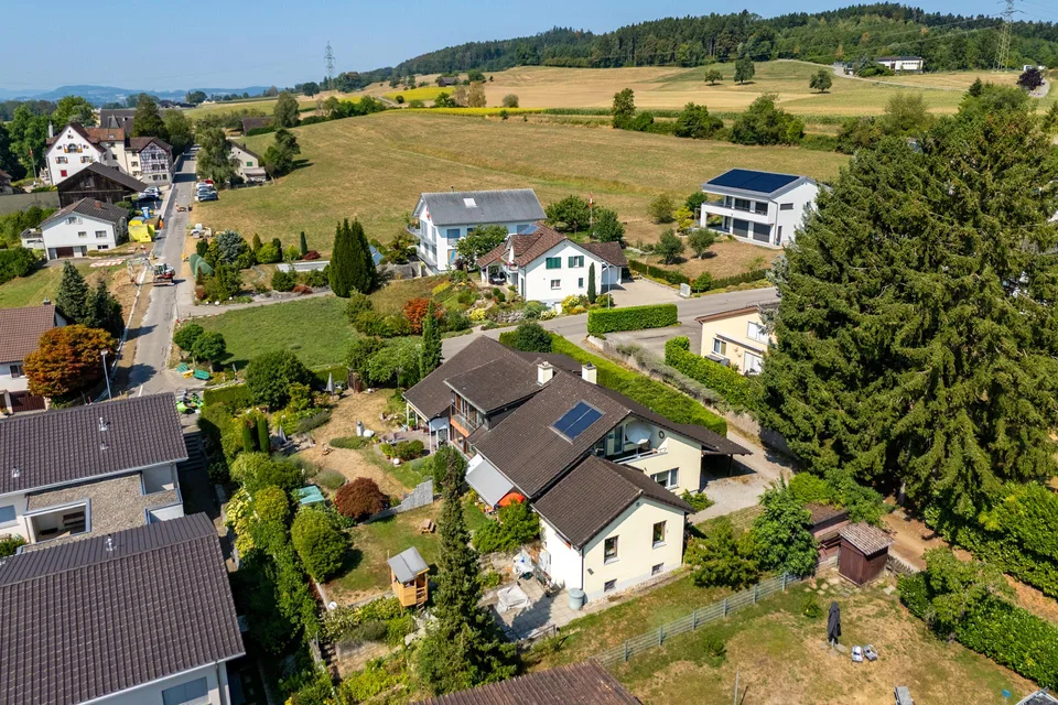 Einfamilienhaus mit Einliegerwohnung und wunderschönem Garten – Foto 4 von 30