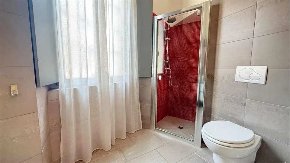 Incantevole Appartamento 2,5 locali con giardino e posto auto – Foto 11 von 13