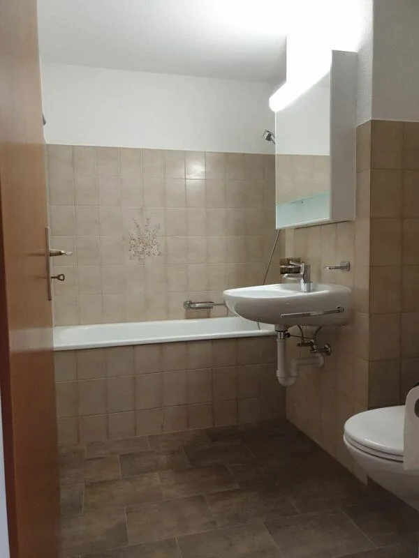 Appartement 2.5 pièces avec espace de jardin – photo 2 sur 6