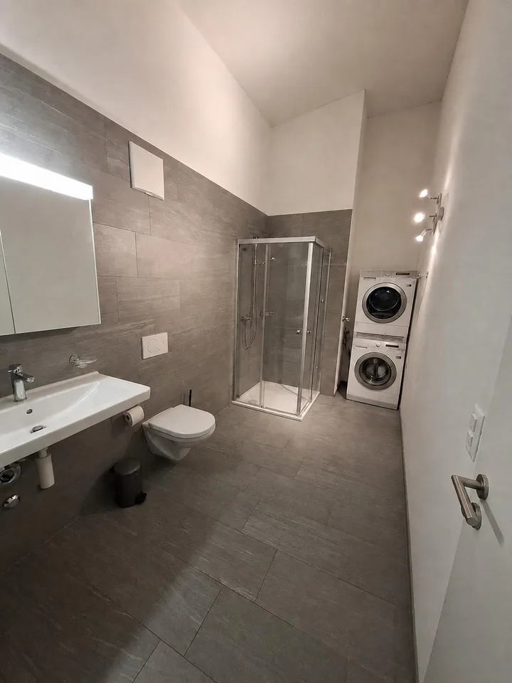 Modern apartment in a green area – photo 4 of 6
