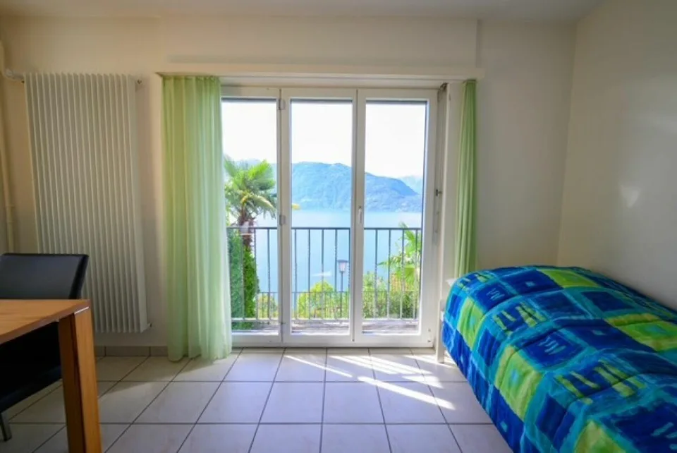 Two-family house with spectacular lake view – photo 6 of 9