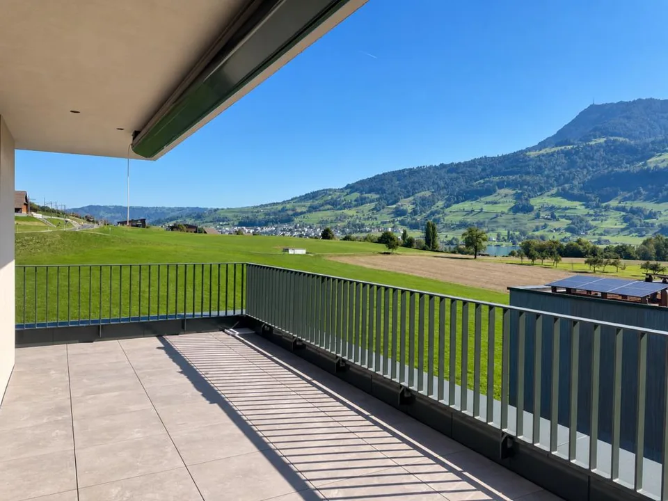 New building - 2.5-room attic apartment with spectacular lake and Alpine views – photo 2 of 7