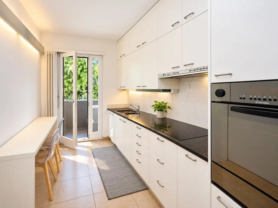 Elegantes Penthouse in Massagno mit herrlicher Aussicht auf den Luganersee – Foto 11 von 20