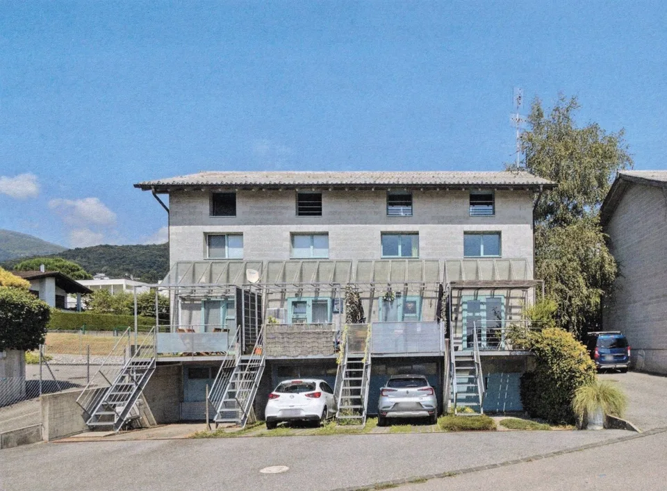 Casa a schiera con terrazza e garage  in un posto tranquillo e soleggiato