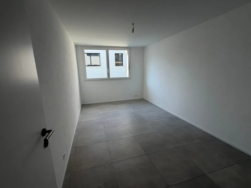 Moderne 3.5-Zimmer-Erdgeschosswohnung mit Gartensitzplatz in Büsserach