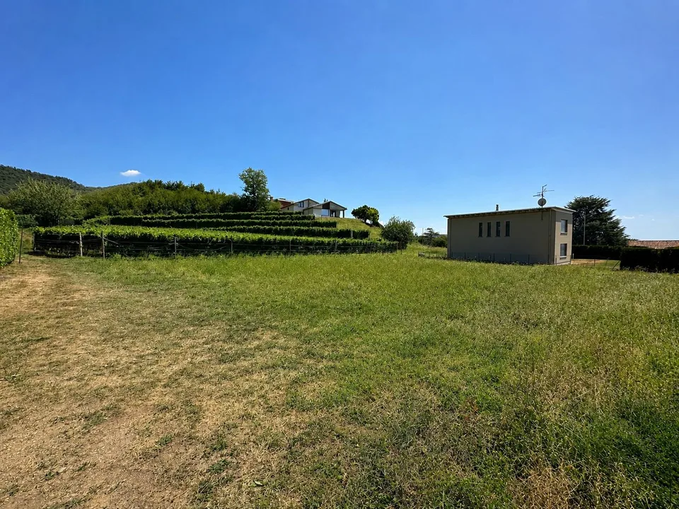 Buildable, flat land in the green with approved project