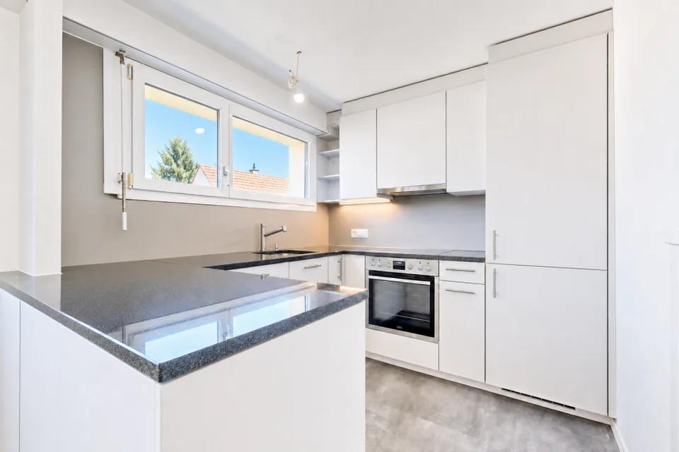 Appartamento 3.5 stanze appena ristrutturato con balcone, cantina, soffitta, lavatrice e posto auto