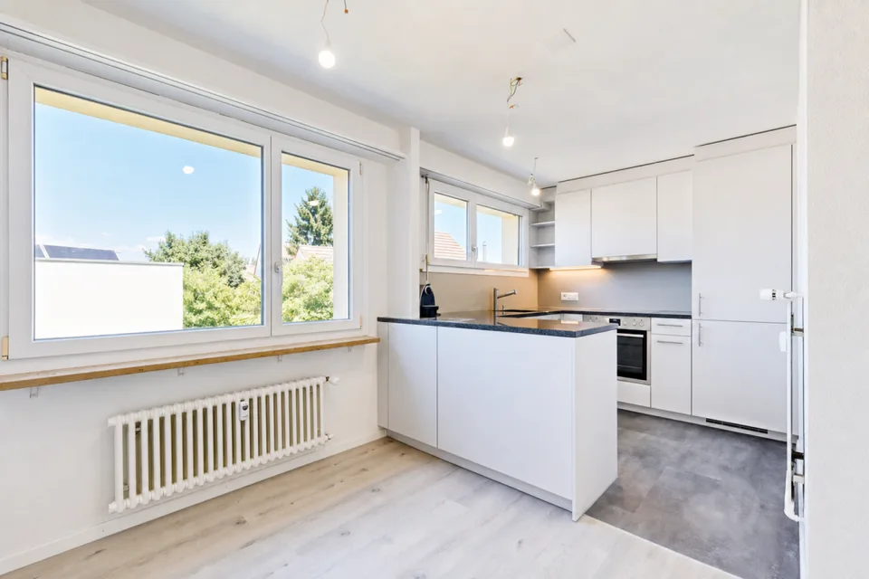 Appartamento 3.5 stanze appena ristrutturato con balcone, cantina, soffitta, lavatrice e posto auto
