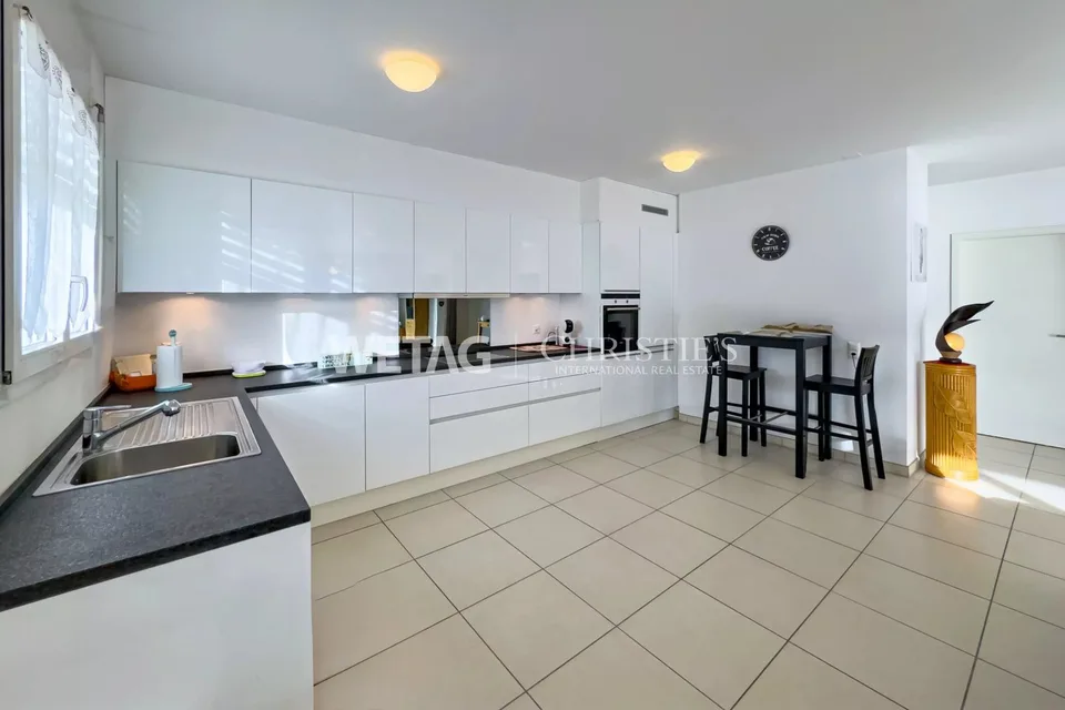 Appartamento mansarda moderno con terrazze spaziose & vista sul Lago Maggiore a Brissago in vendita