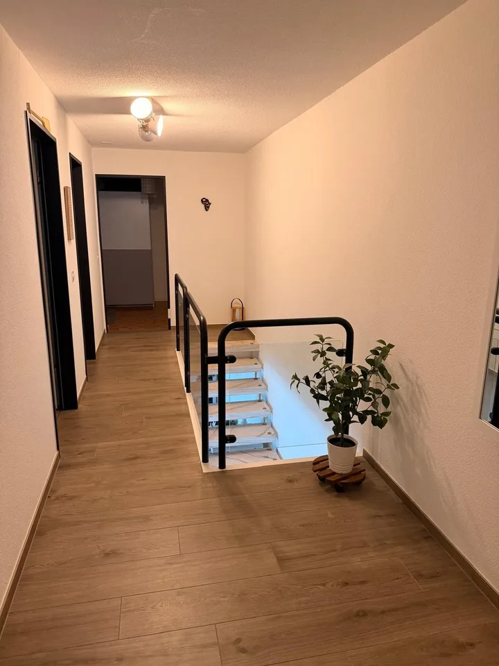 Esclusiva casa a terrazza di 5,5 locali con vista panoramica & wellness