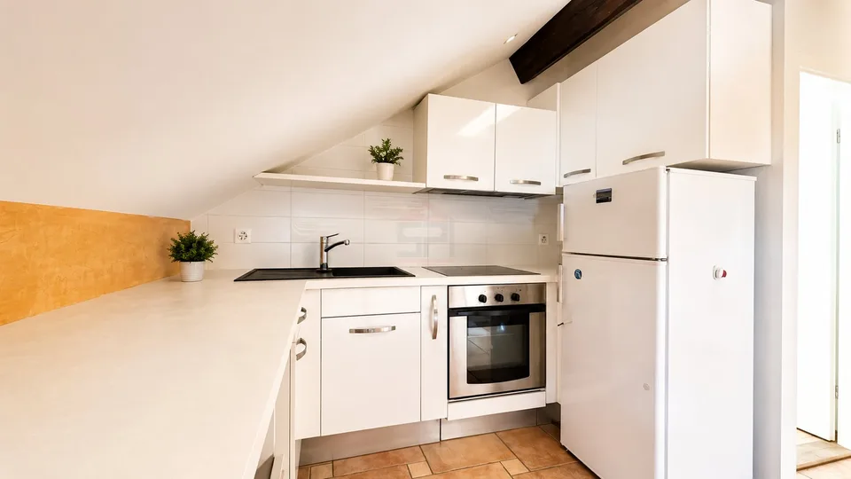 Incantevole appartamento attico di 3.5 locali in una residenza unica