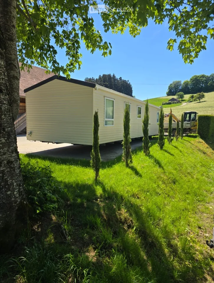 Mobil-home dans camping résidentiel