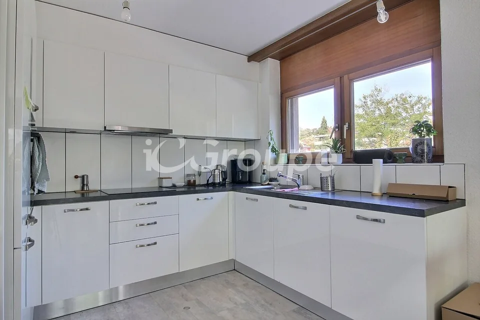 Appartement de 3.5 pièces au rez-de-chaussée dans un quartier calme.