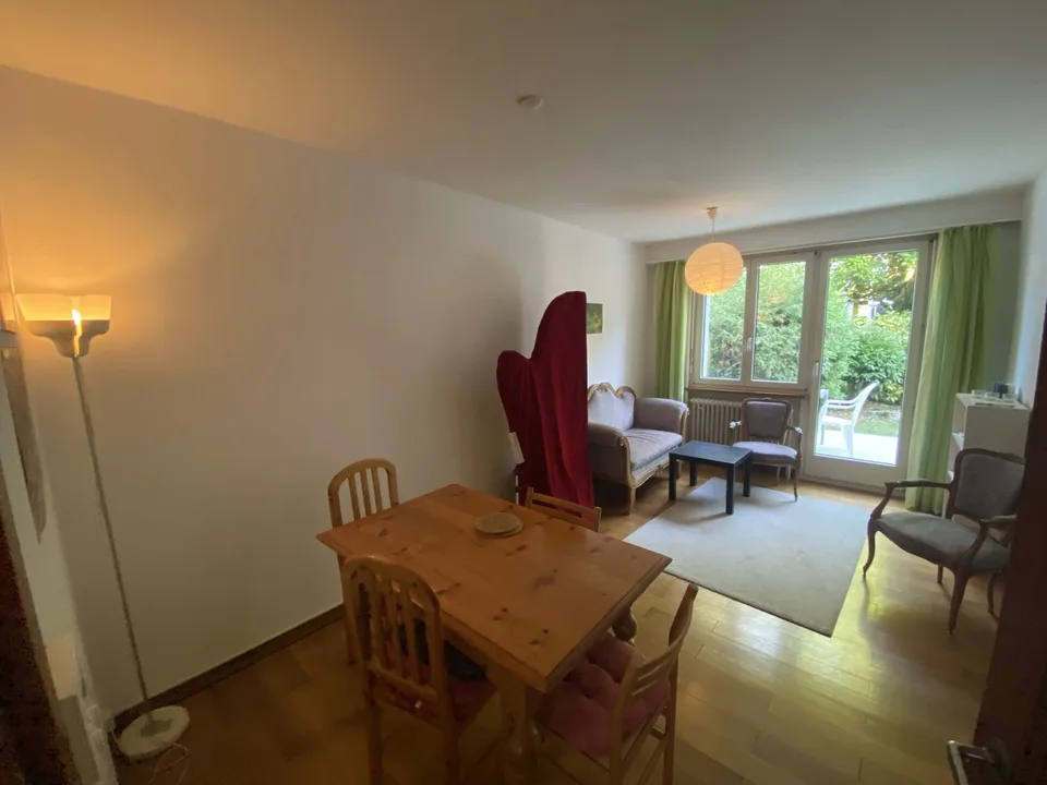 Bright shared apartment room with living room and garden in Basel