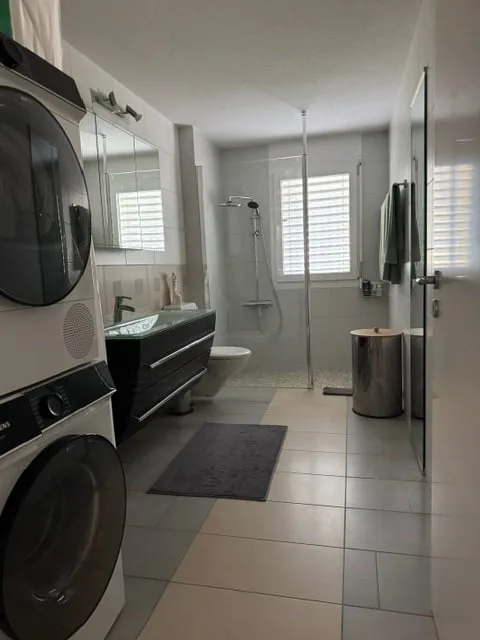 Appartement de 4.5 pièces au rez-de-chaussée avec jardin