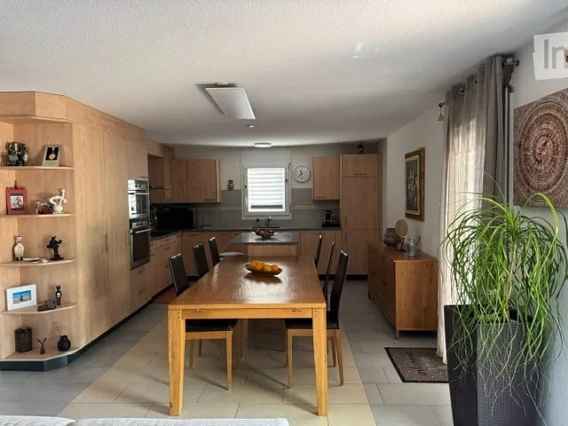 Appartement de 4.5 pièces au rez-de-chaussée avec jardin