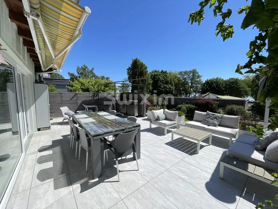 Appartement 5.5 pièces avec terrasse et jardin au bord du lac