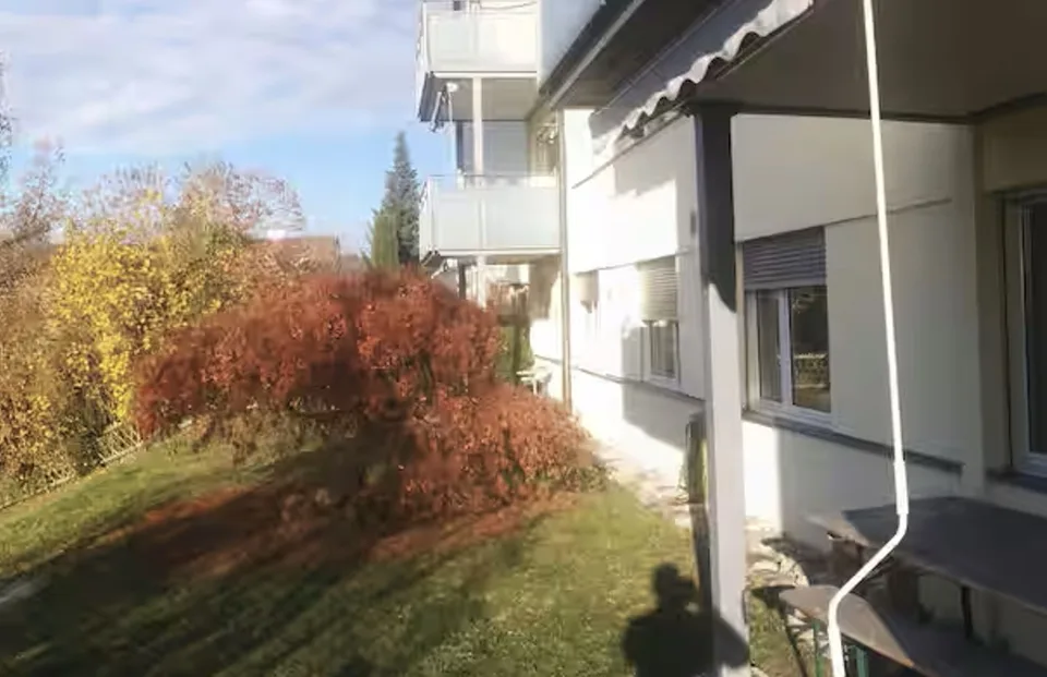 Charming 1.5-room studio with garden and view over the city of Zurich
