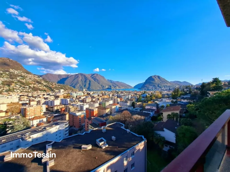 GELEGENHEIT: Luxuswohnung an top Lage mit Pool & Seesicht über Lugano auf den Lago Lugano