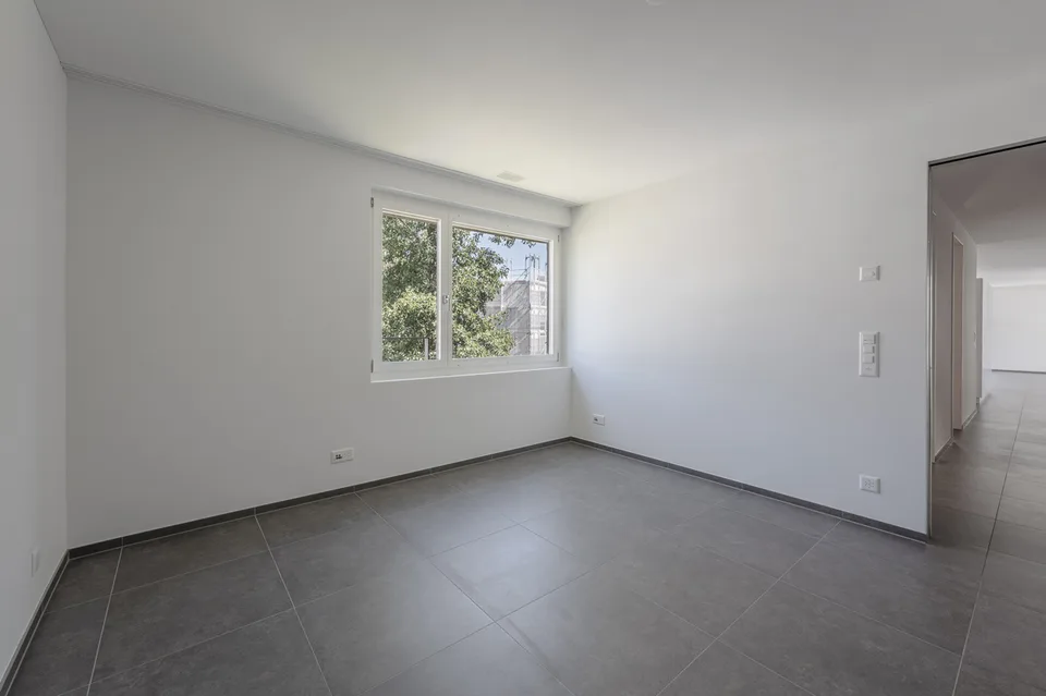 Appartement moderne et spacieux de 2,5 pièces avec place de parking – photo 5 sur 13