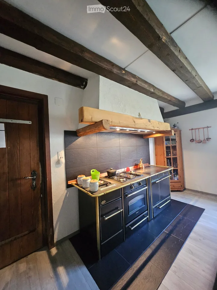Wohnung mit Charakter in Couvet – Historisches renoviertes Gebäude