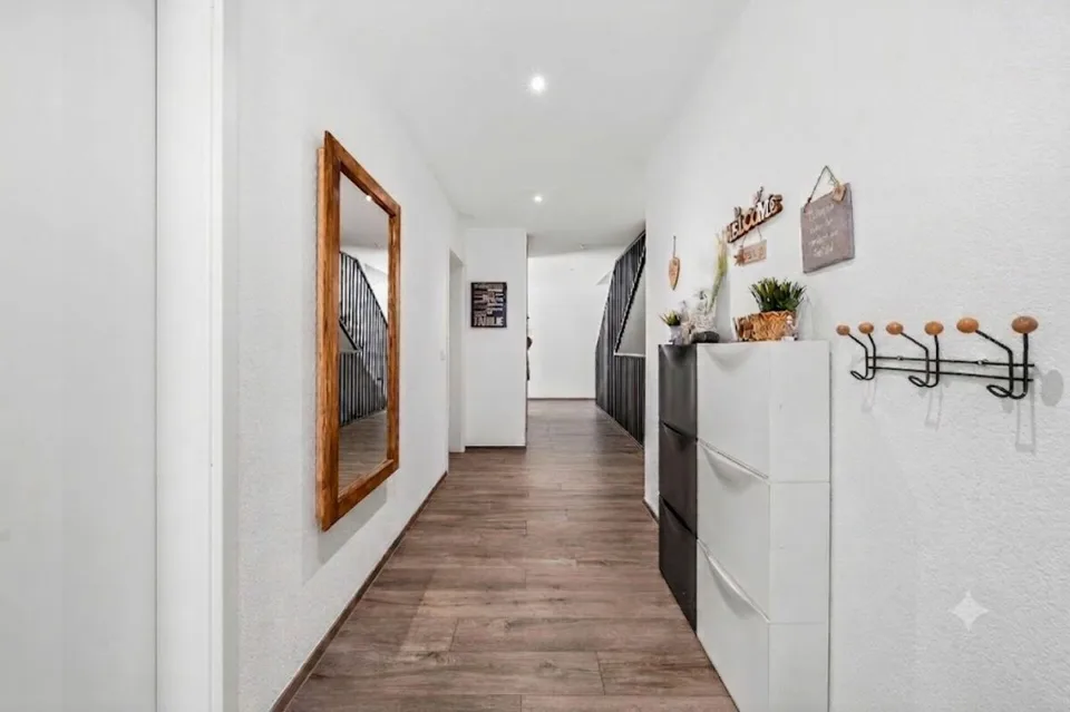 Casa a schiera di 6,5 locali con appartamento di 3,5 locali separato al piano superiore