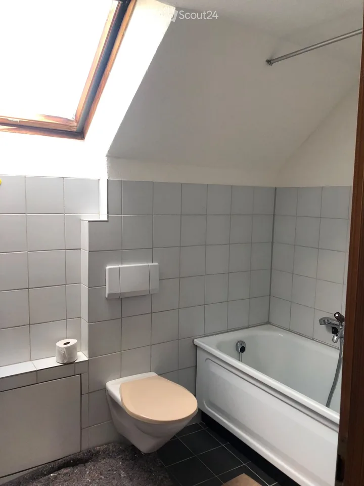 Appartement mansardé charmant dans un immeuble ancien calme