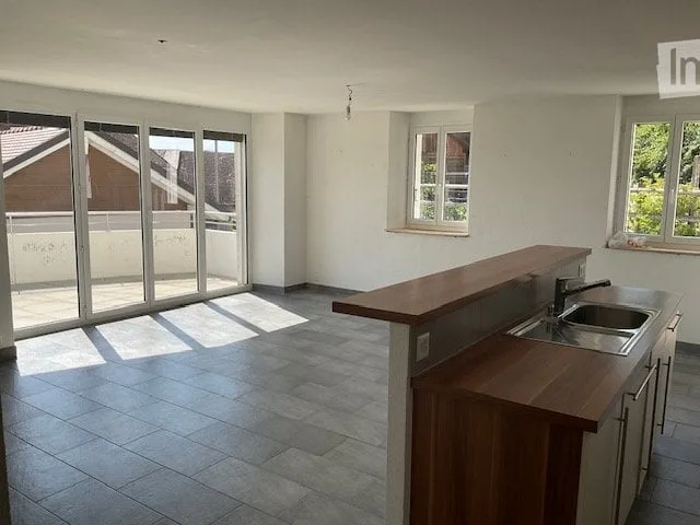 Appartement 3.5 pièces rez-de-chaussée, balcon et jardin
