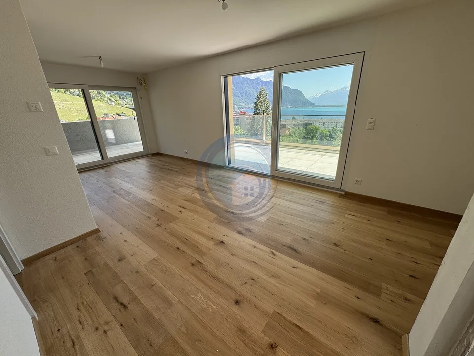 Appartamento di 2,5 locali in attico con vista panoramica sul lago