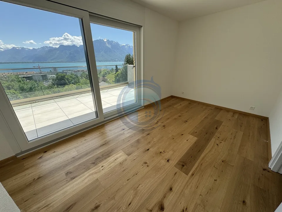 Appartamento di 2,5 locali in attico con vista panoramica sul lago