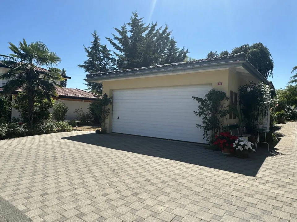 Einfamilienhaus mit 5.5 Zimmern und Garage