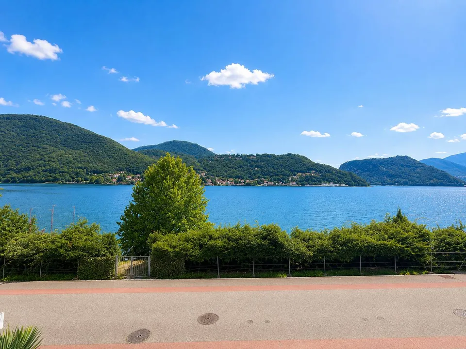 Esclusiva casa vista lago tra Morcote e Figino