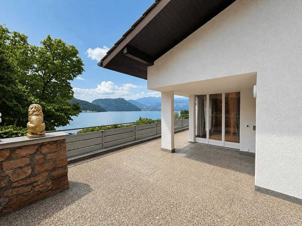 Esclusiva casa vista lago tra Morcote e Figino