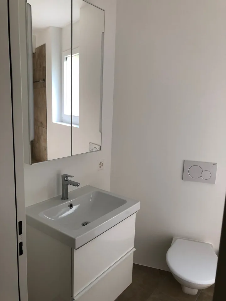 Appartement mansardé lumineux de 3,5 pièces à Torricella-Taverne