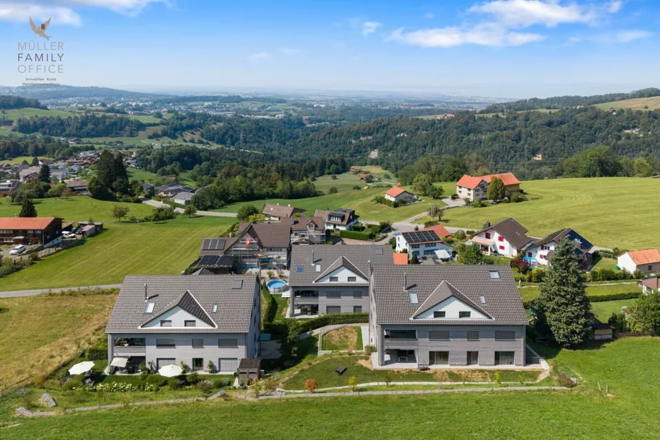 Vivere come in una casa unifamiliare - Appartamento di giardino esclusivo 4 1/2 locali con bella vista sul lago, molta privacy e costruzione di alta qualità