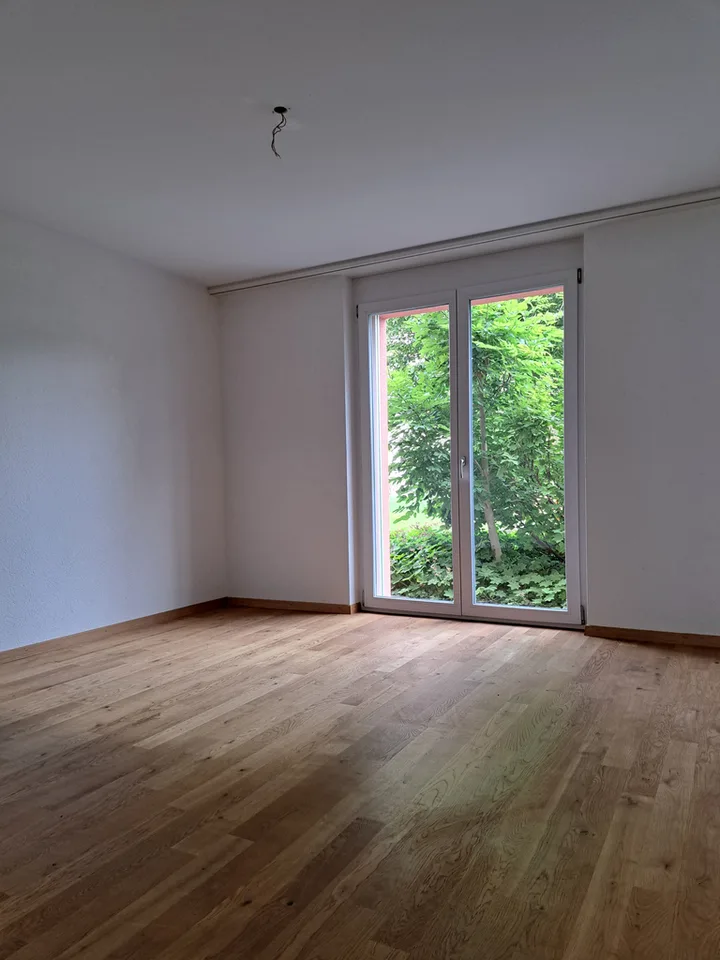 Appartement attractif avec jardin d'hiver