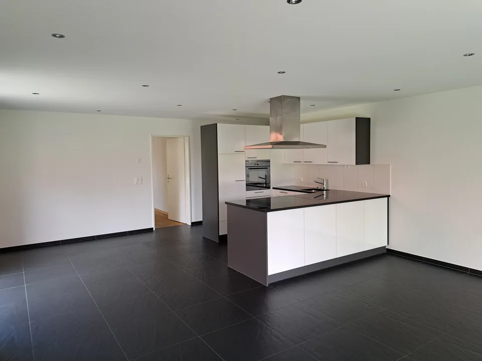 Appartement attractif avec jardin d'hiver