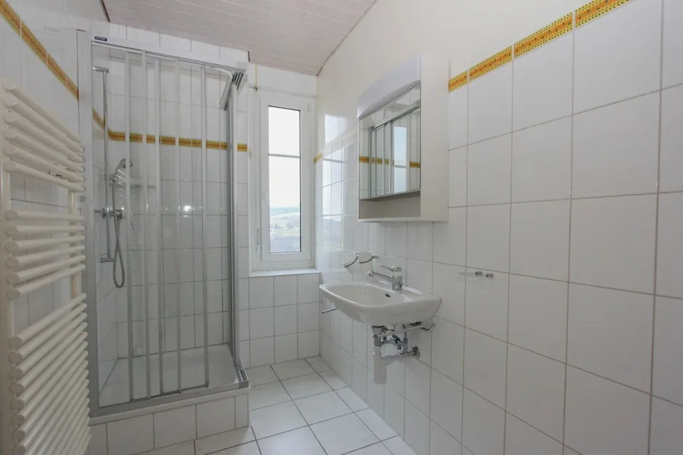 Bel appartement de 4 pièces au 1er étage avec garage