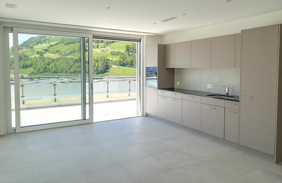 Erstvermietung: 2.5-Zimmer-Attikawohnung mit Bergblick