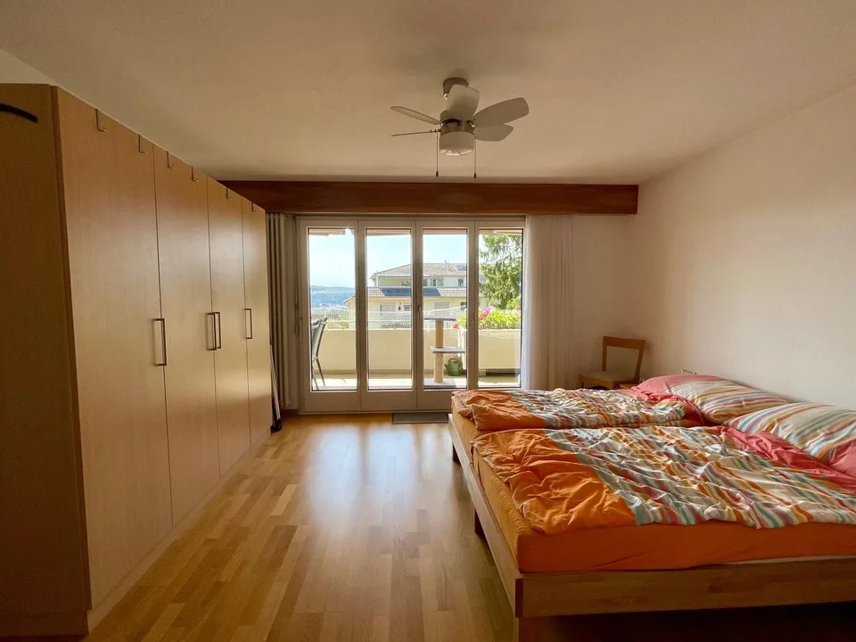 Cozy living with a beautiful balcony, stunning views, and including a hobby room