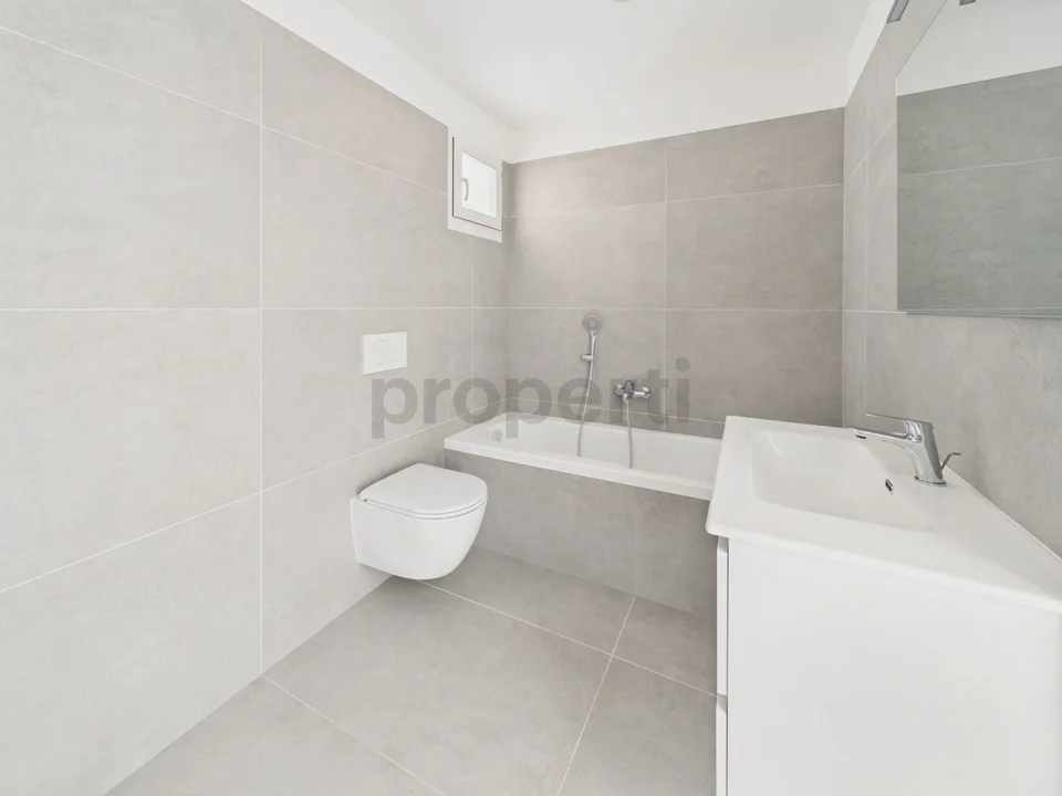 Modernes 2.5-Zimmer-Apartment mit Parkplatz und Lademöglichkeit, Biasca