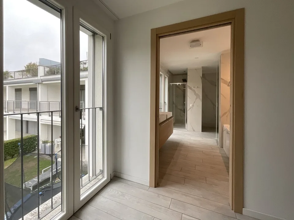 CASLANO - GROßZÜGIGES 6.5 ZIMMER-WOHNUNG MIT SCHWIMMBAD ZUM VERKAUF