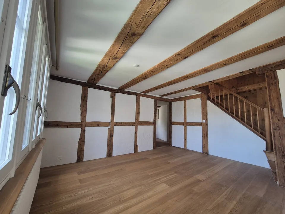 Einzigartiges Bijou im Herzen von Zürich: 3-Zimmer-Dachwohnung mit historischem Charme