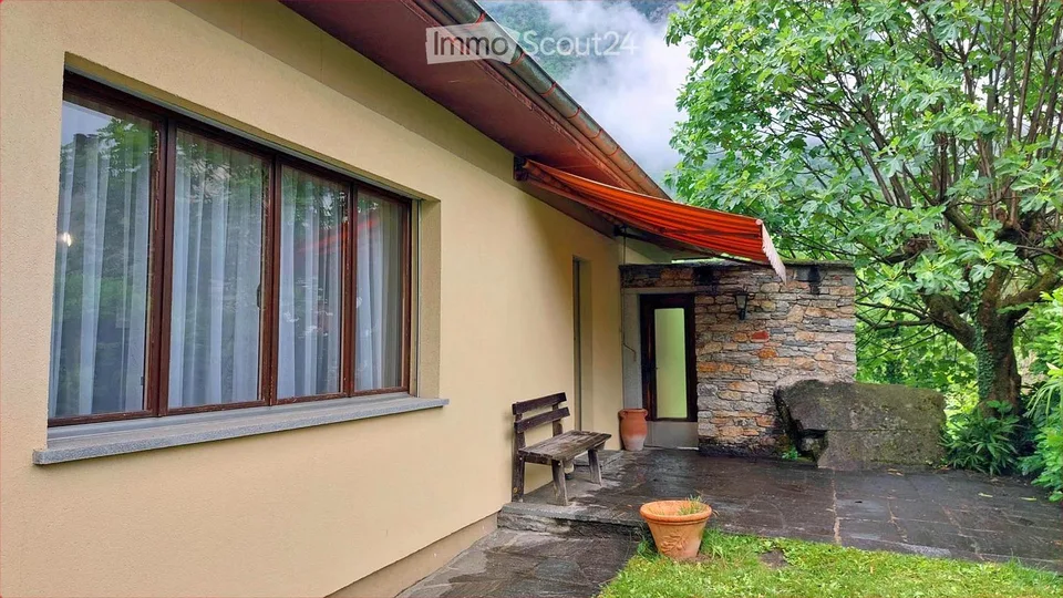 Ein Haus mit hoher Lebensqualität <>  Una casa con un'alta qualità di vita